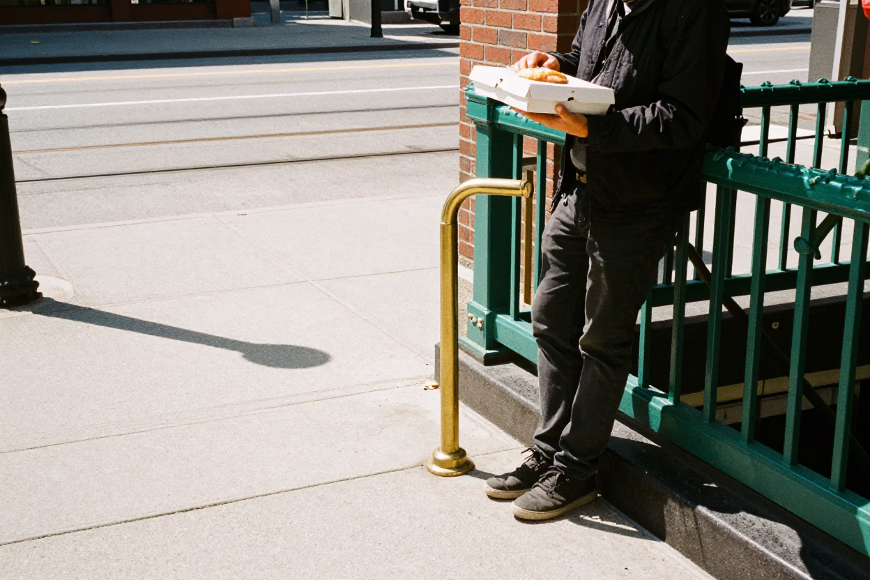 Midday Toronto Street Scene with Brass Handle and Pastry Box on Sidewalk in in Toronto, Ontario, Canada