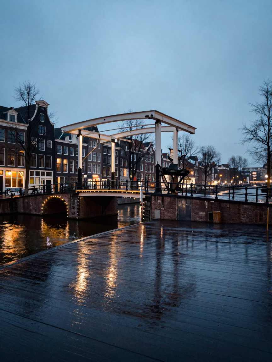 Midnight Amsterdam Canal Bridge Wet Lacquered Wood Reflections and Urban Stillness in in Amsterdam, Netherlands