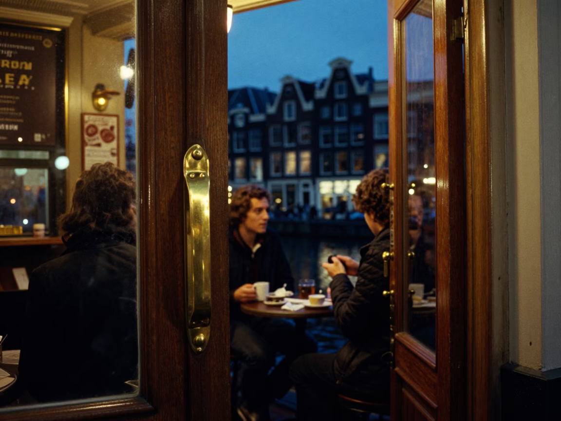 Midnight Amsterdam Canal Scene with Vintage Brass Details and Coffee Shop Interior in in Amsterdam, Netherlands