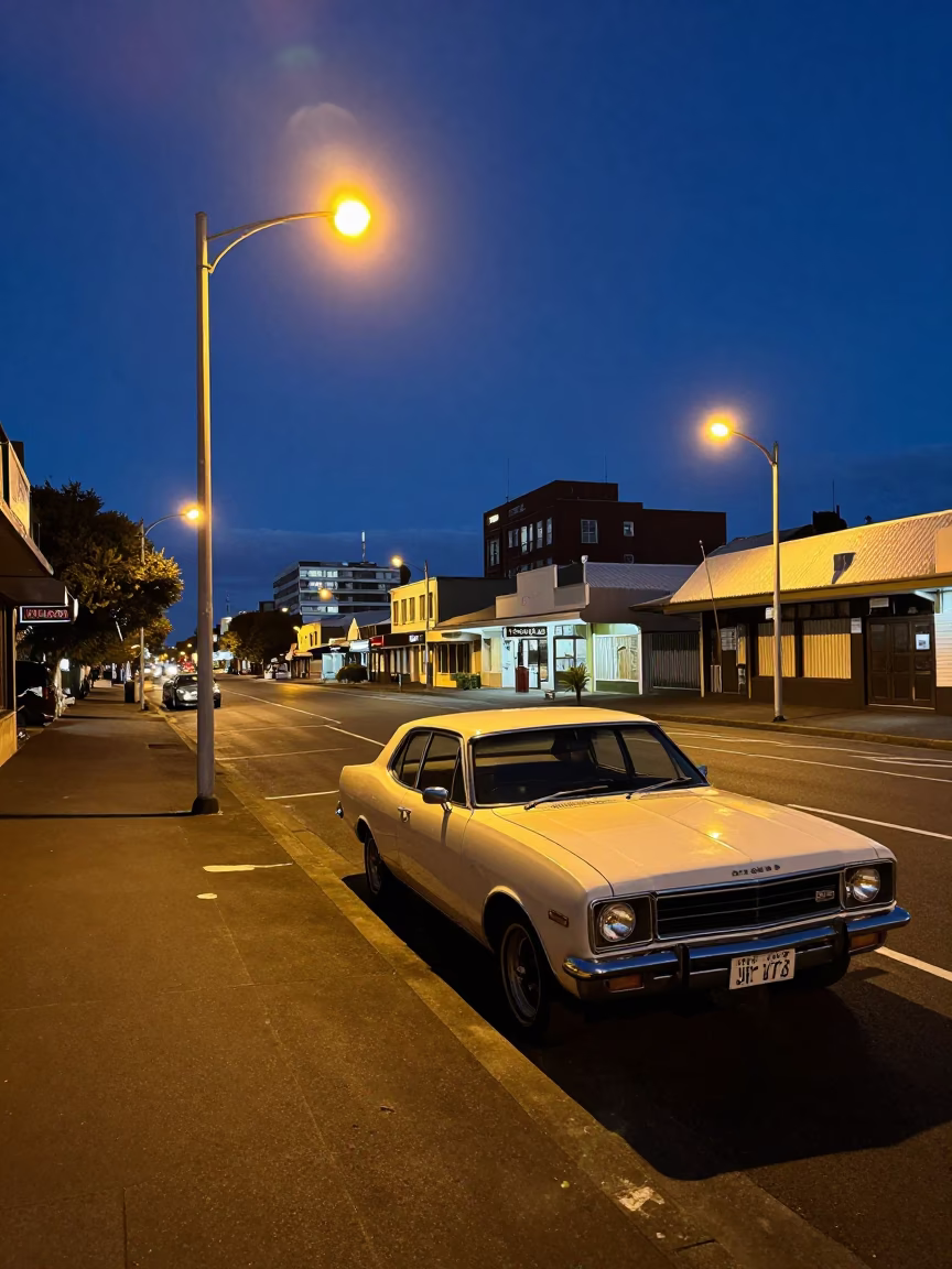 Midnight Auckland Street Scene with Vintage 1970s Car and Streetlights in in Auckland, New Zealand