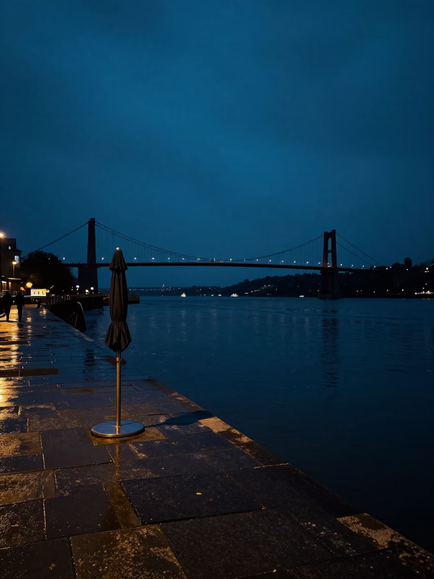 Midnight Bristol Harbor View with Umbrella Stand and Wet Pavement Reflections in in Bristol, United Kingdom