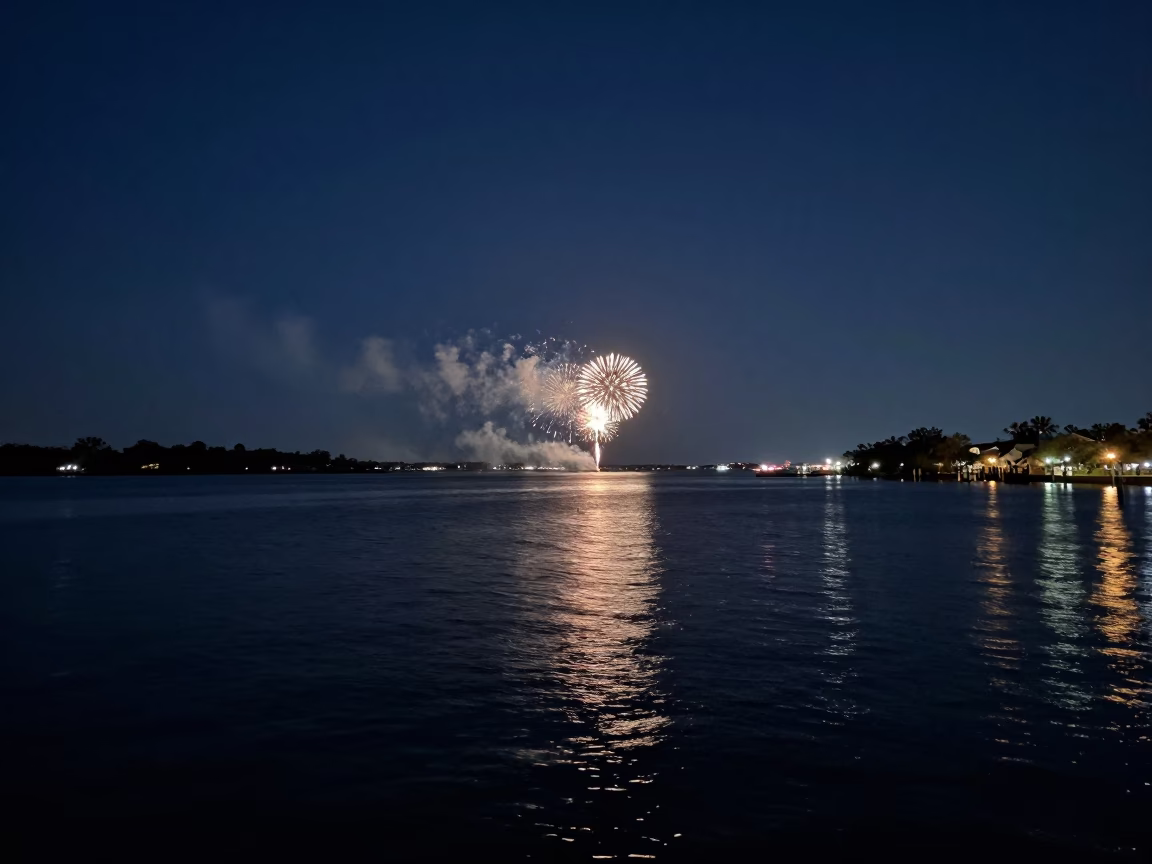 Midnight Charleston Harbor View with Distant Fireworks Over Water in in Charleston, South Carolina, United States