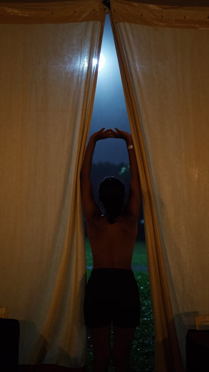 Midnight Circus Acrobat Stretching in Seychelles in under a circus tent in Victoria Seychelles