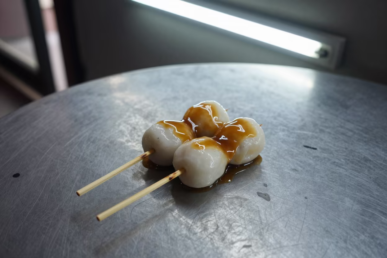 Midnight Dango Skewer at Surabaya Diner in at a roadside diner table in Surabaya