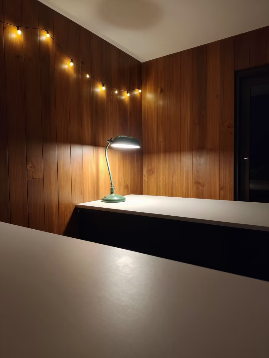 Midnight Den with Green Lamp and Lagos String Lights in in a sunlit living room near Lagos
