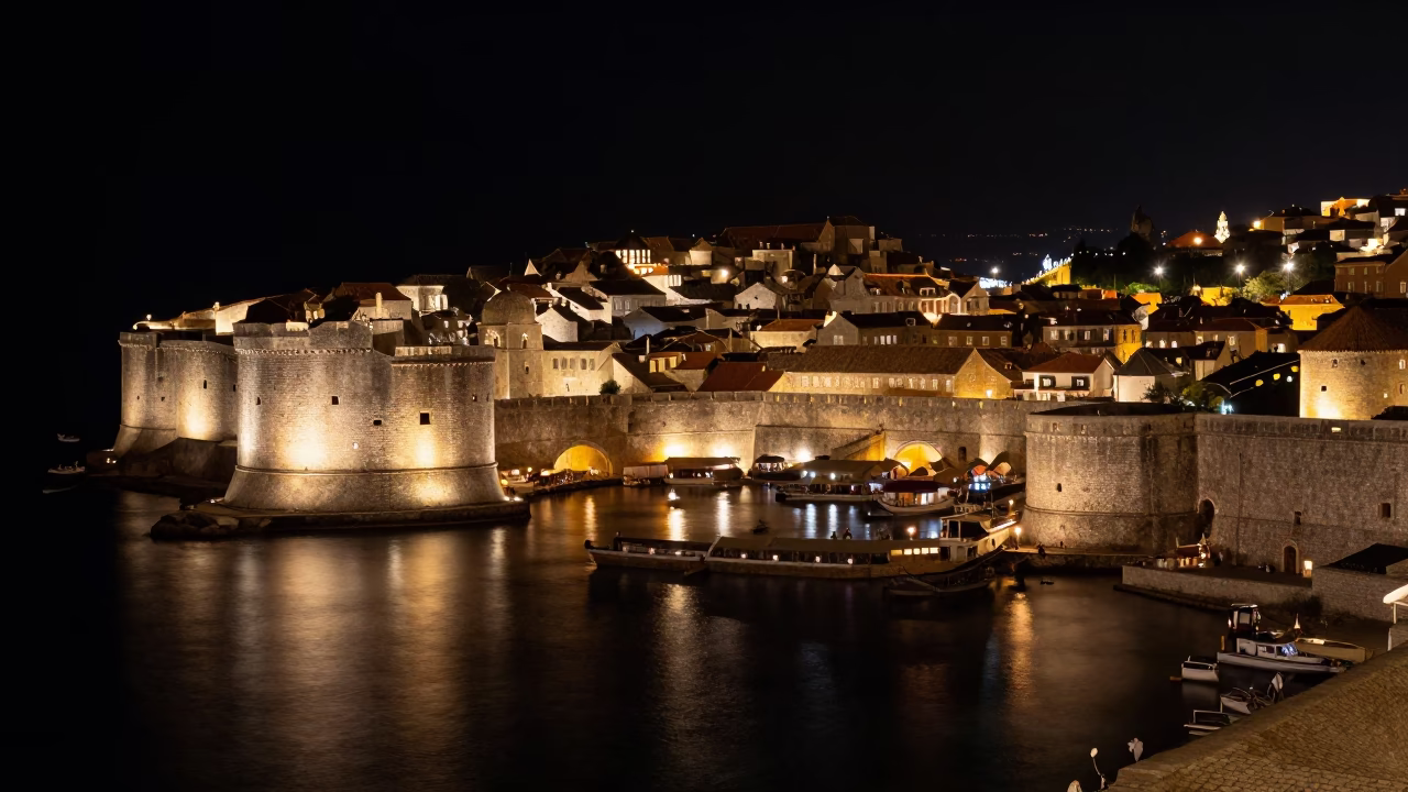 Midnight Dubrovnik Harbor View with Illuminated Old City Walls and Stone Architecture in in Dubrovnik, Croatia