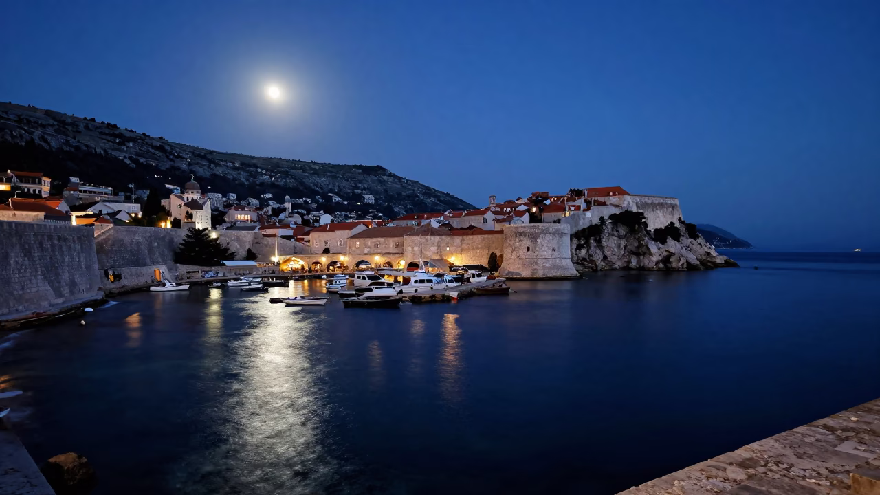 Midnight Dubrovnik Harbor View with Moored Boats and Stone Walls in in Dubrovnik, Croatia