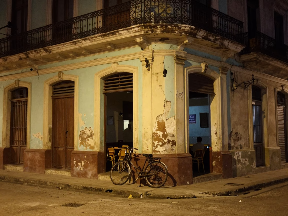 Midnight Havana Street Scene with Bicycle Leaning Against Cafe and Lamp Base in in Havana, Cuba