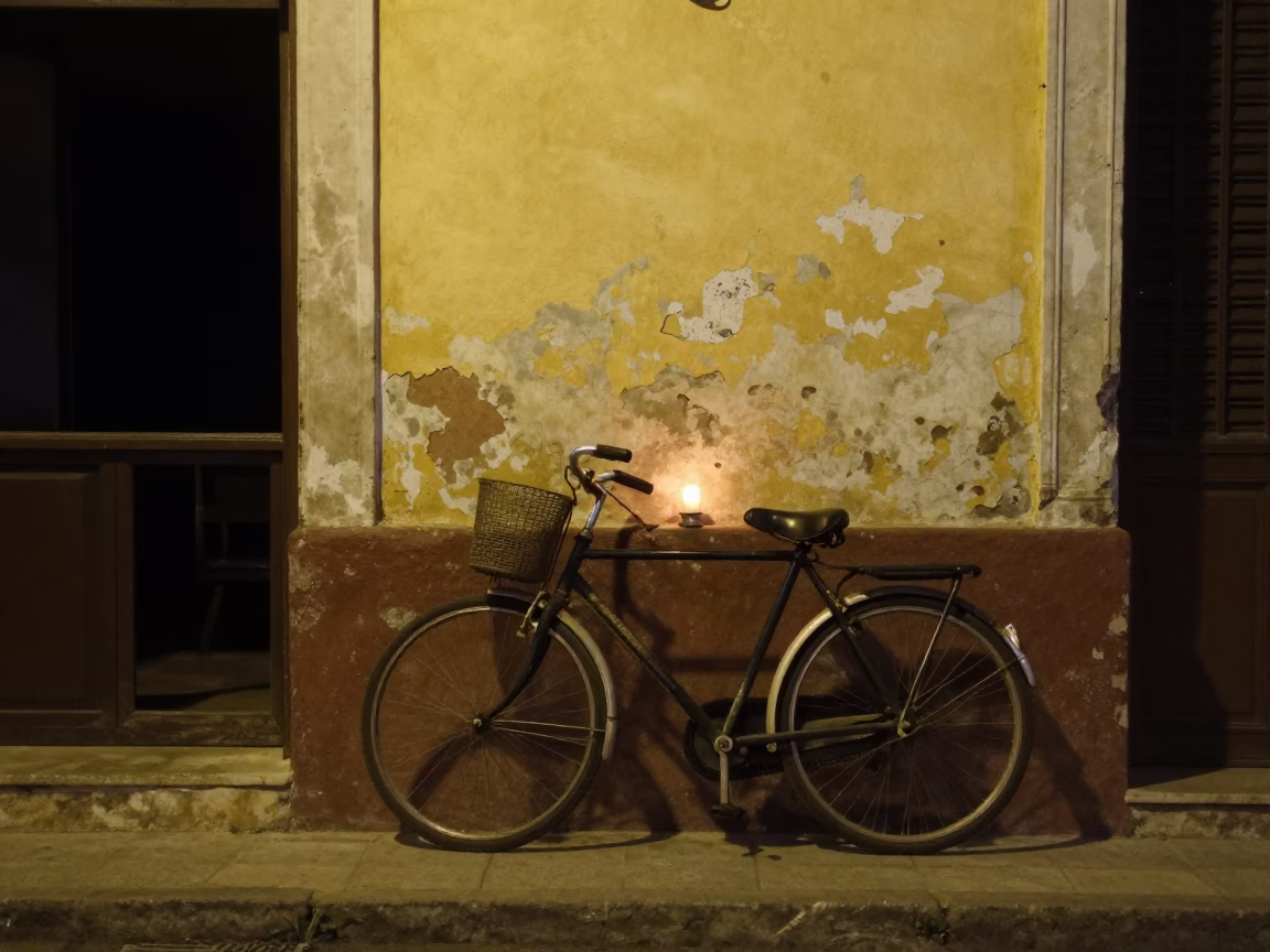 Midnight Havana Street Scene with Bicycle Leaning Against Cafe Wall and Candle Holder in in Havana, Cuba