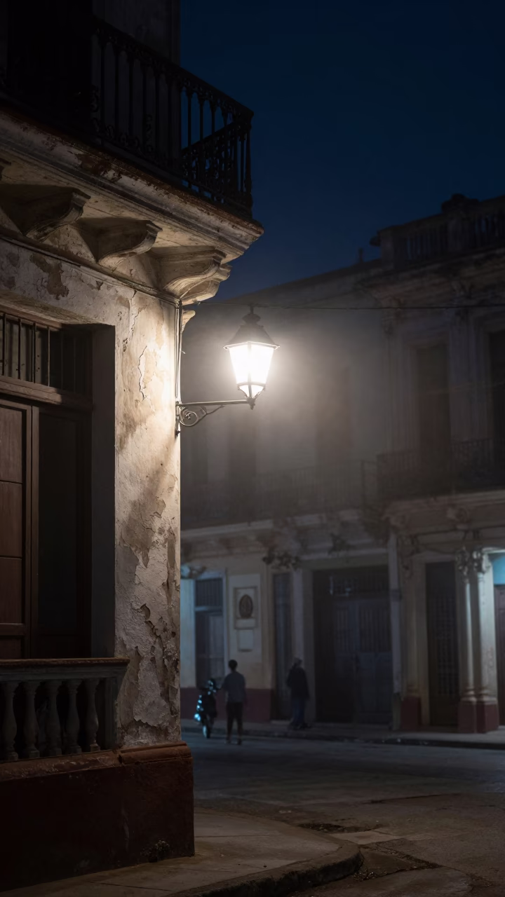 Midnight Havana Street Scene with Glowing Lantern and Watering Jug on Balcony in in Havana, Cuba