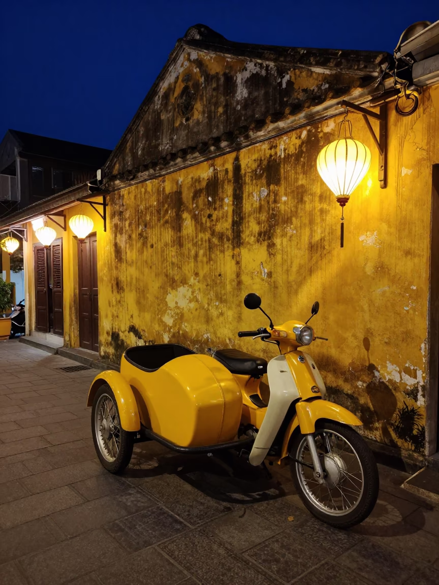 Midnight Hoi An Street Scene with Vintage Motorcycle and Local Market Activity in in Hoi An, Vietnam