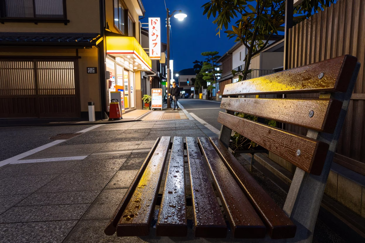 Midnight Kyoto Street Scene with Condensation on Bench and Local Nightlife in in Kyoto, Japan