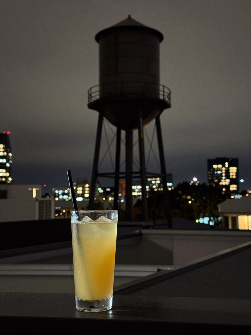 Midnight Melbourne Rooftop Water Tower View with Sugarcane Juice and Wicker Basket in in Melbourne, Victoria, Australia