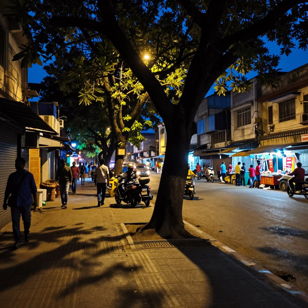Midnight Mumbai Street Scene with Tree and Local Market Activity in in Mumbai, India