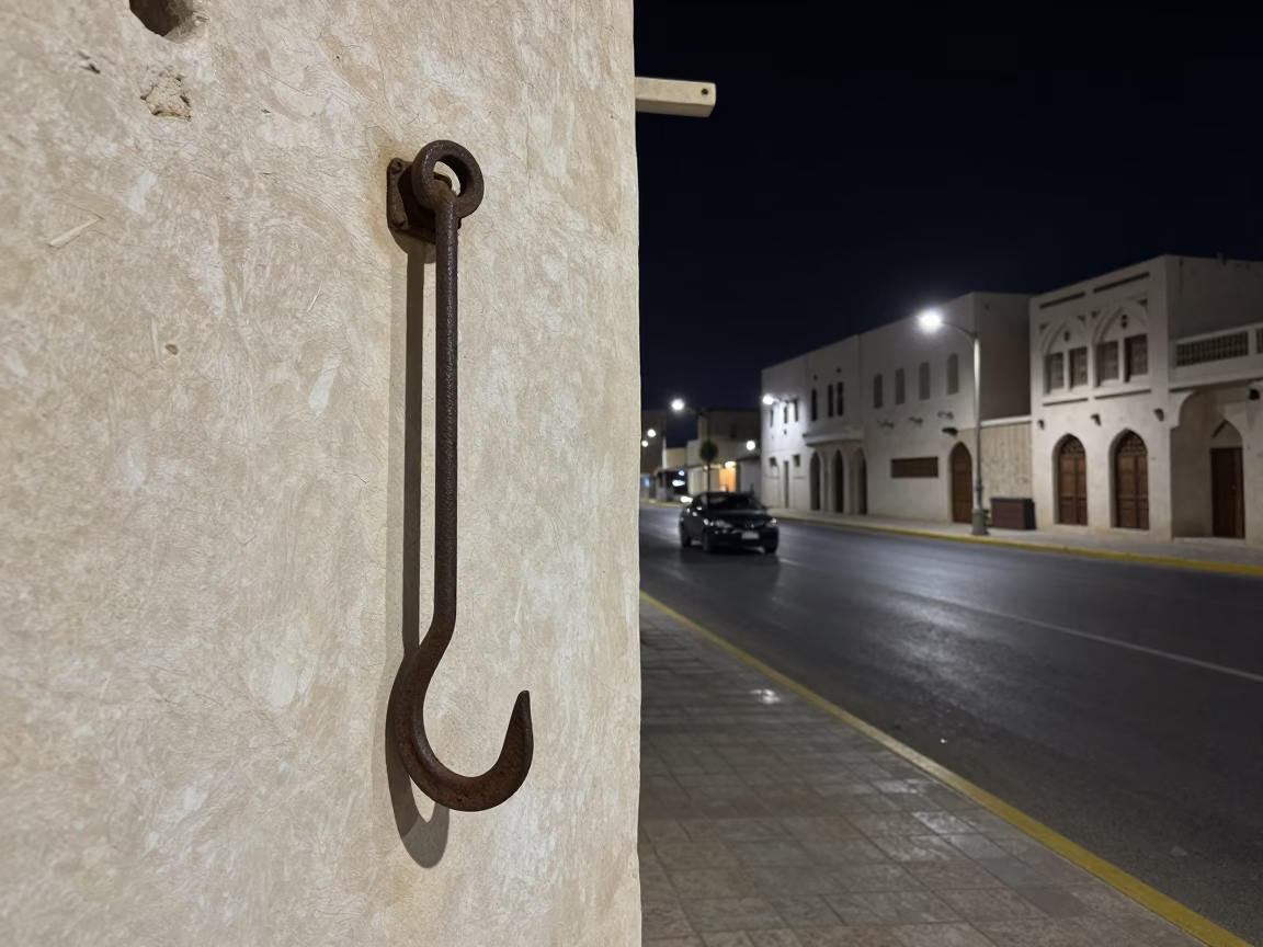 Midnight Muscat Street Scene with Iron Hook and Highway Flyover in in Muscat, Oman