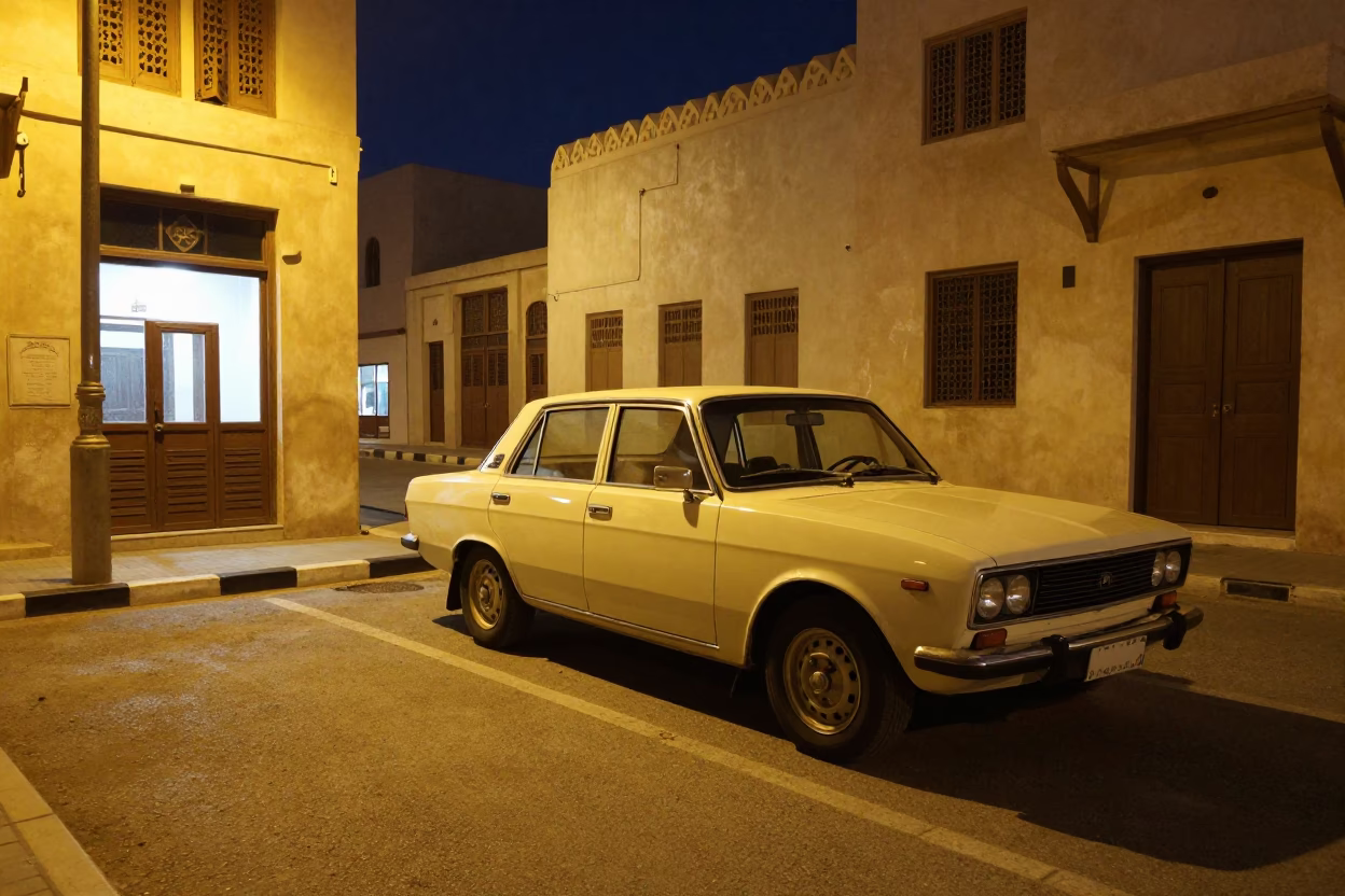 Midnight Muscat Street Scene with Vintage Car and Local Shopkeeper in in Muscat, Oman