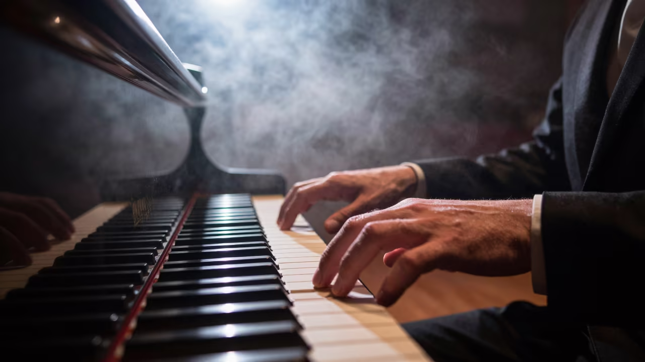 Midnight Piano Chord Oslo Stage Haze in on a dimly lit stage in Oslo
