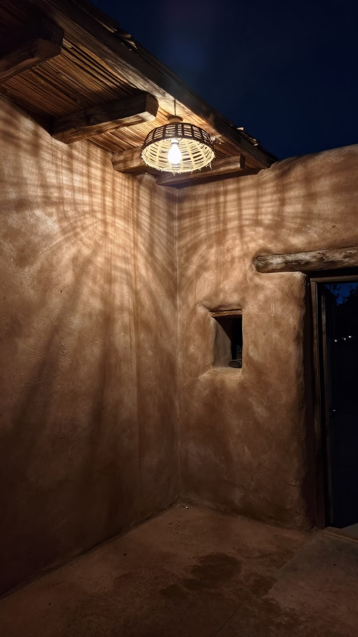 Midnight Santa Fe Adobe Interior with Water Stains and Wicker Shadows in in Santa Fe, New Mexico, United States