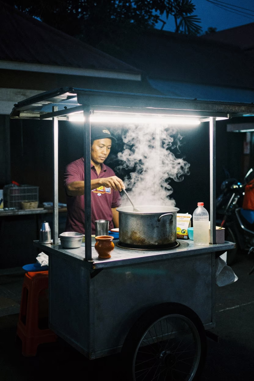Midnight street food stall in Denpasar Indonesia with ceramic cup and pickle jar in in Denpasar, Indonesia
