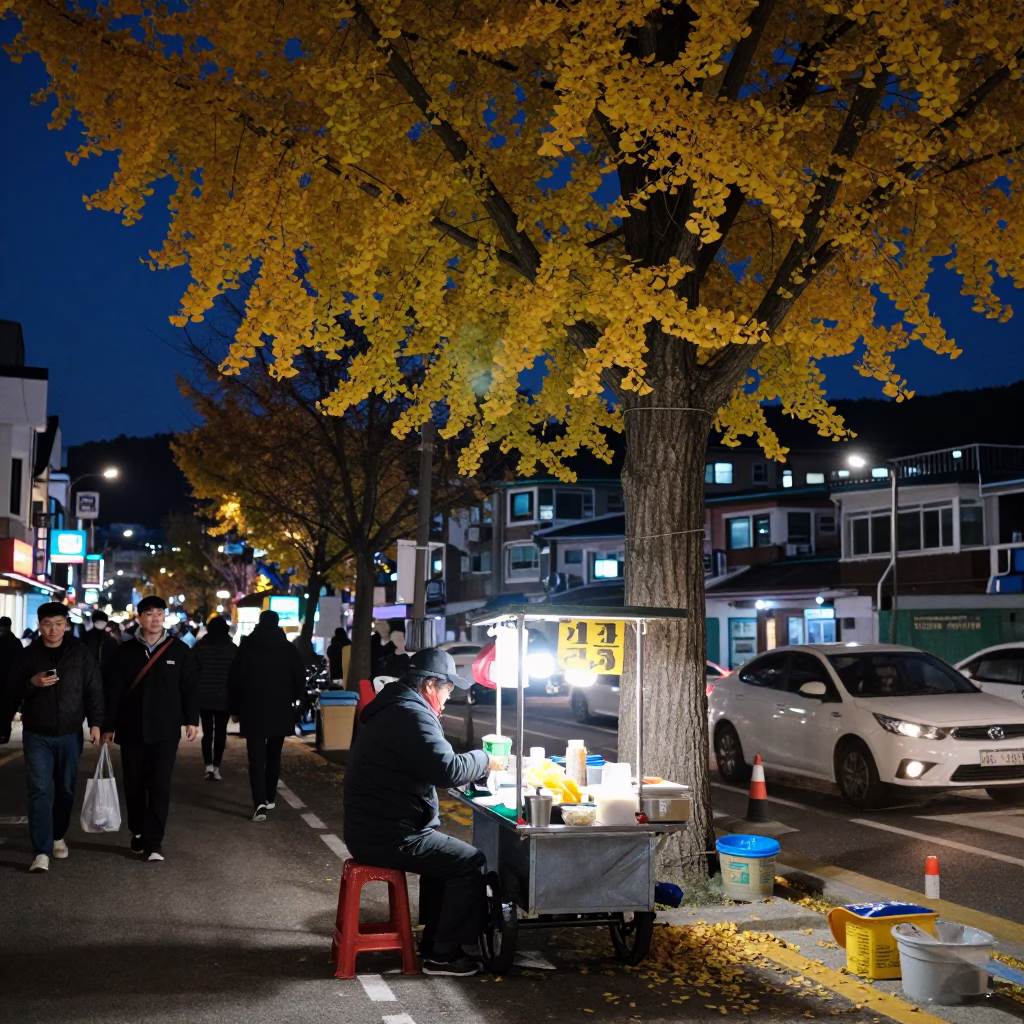 Midnight street food vendor in Busan South Korea with ginkgo tree and tea canister in in Busan, South Korea