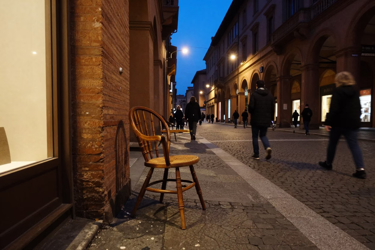 Midnight Street Life in Bologna Italy with Spindle Chair and Glass Tumbler in in Bologna, Italy