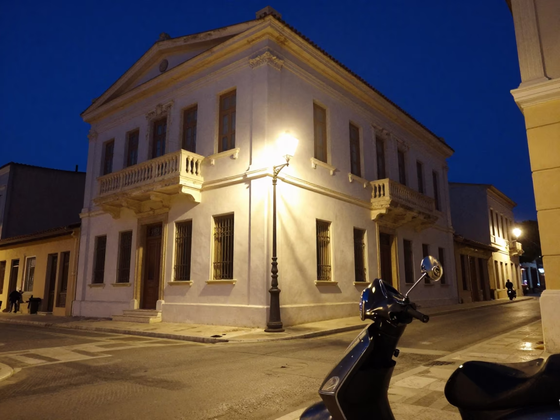 Midnight street scene in Athens Greece with illuminated historic architecture and local night activity in in Athens, Greece