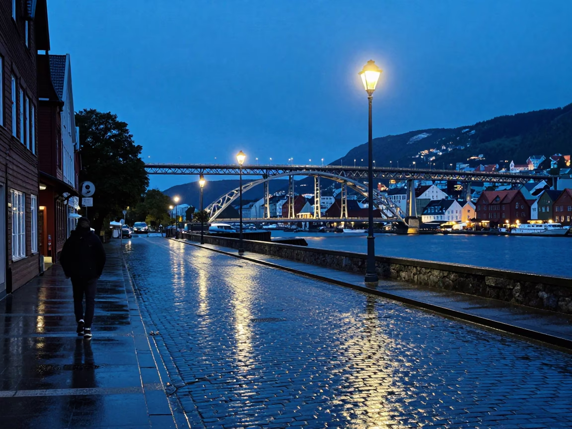 Midnight Street Scene in Bergen Norway with Floodlit Iron Bridge and Night Train Crossing in in Bergen, Norway
