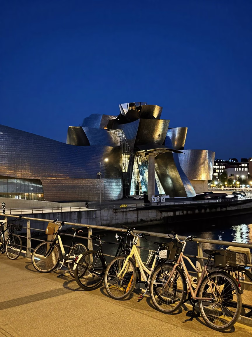 Midnight street scene in Bilbao Spain with bicycles and urban architecture in in Bilbao, Spain