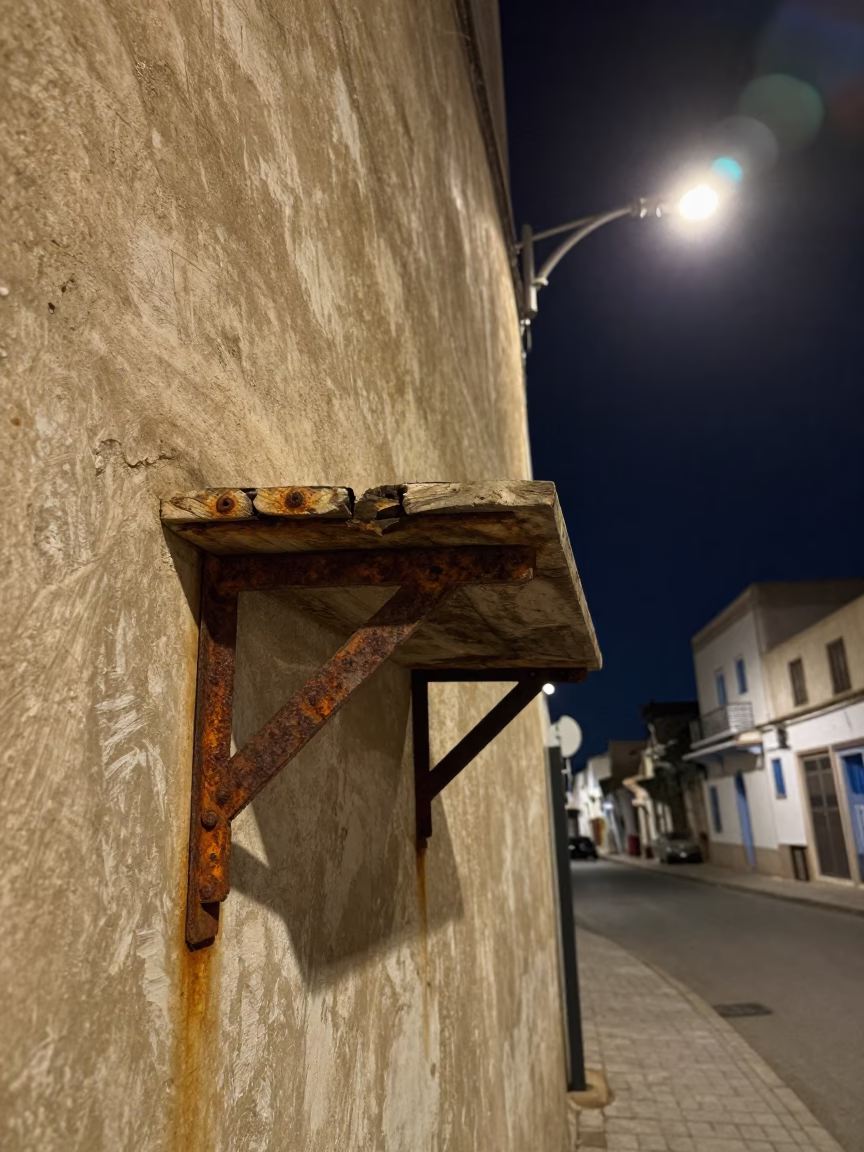 Midnight Street Scene in Casablanca Morocco with Rusty Shelf Bracket and Glass Jar in in Casablanca, Morocco