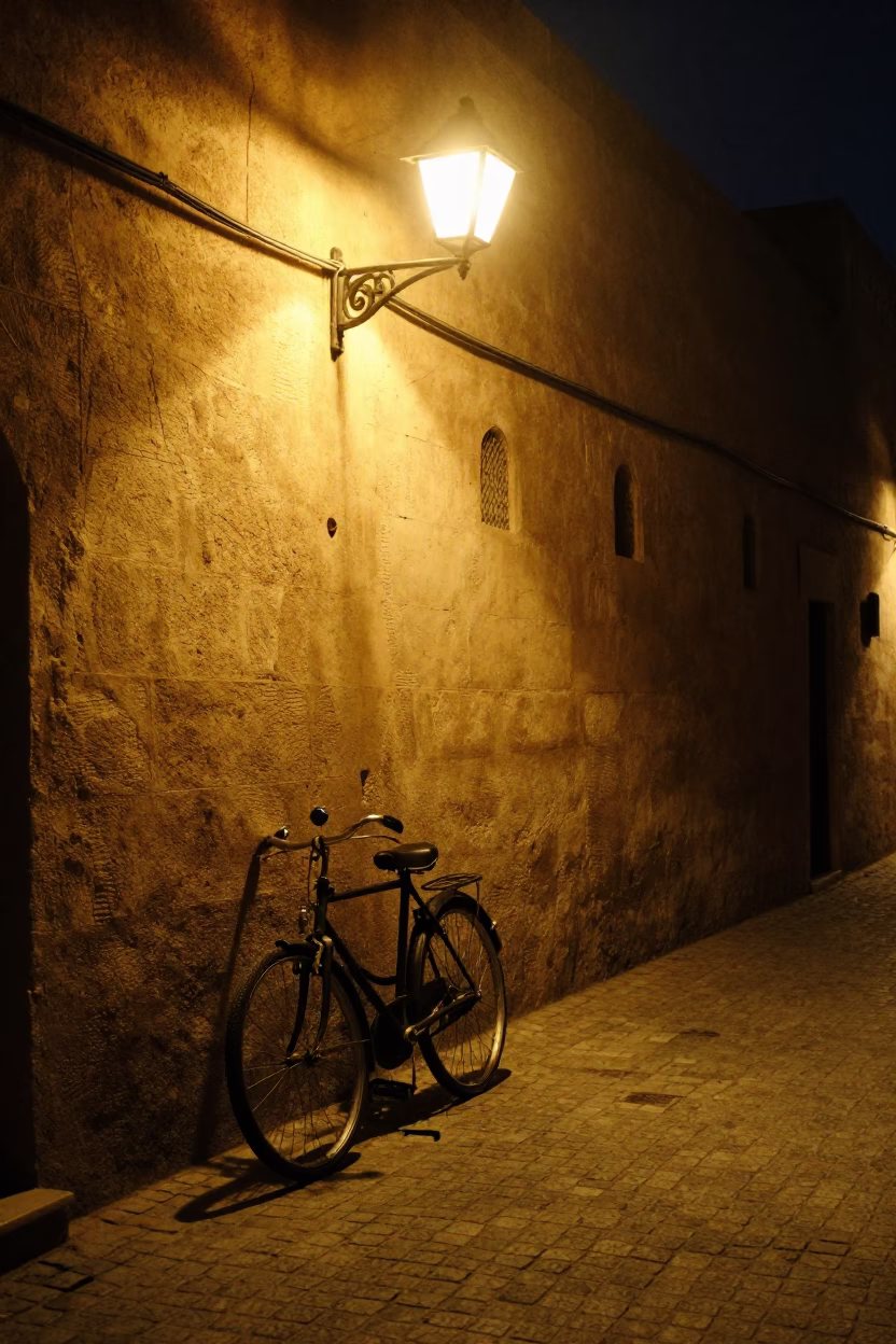 Midnight Street Scene in Fez Morocco with Bicycle and Deadbolt Lock on Wooden Door in in Fez, Morocco