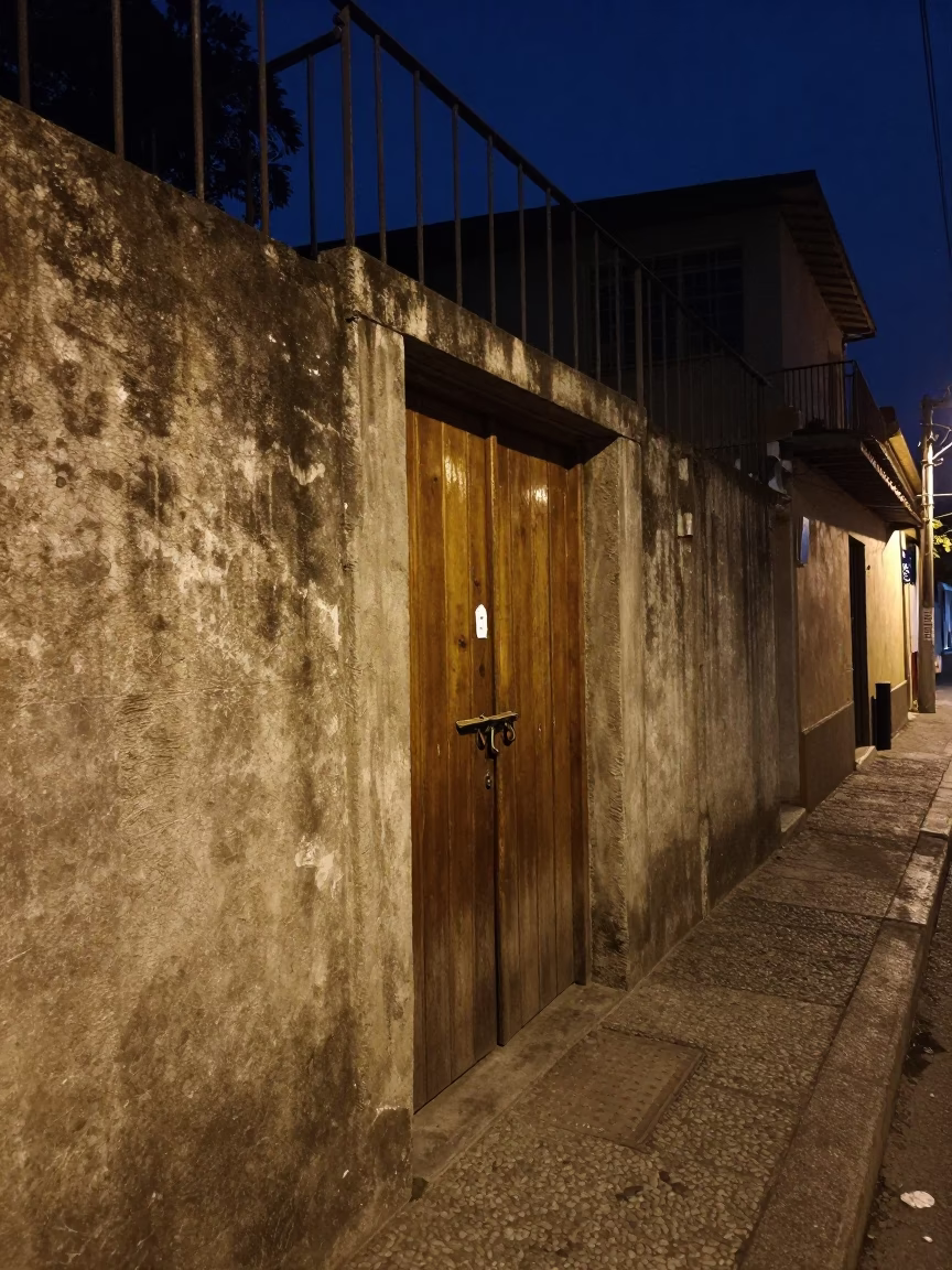Midnight Street Scene in Medellin Colombia with Stair Rail and Deadbolt in in Medellin, Colombia
