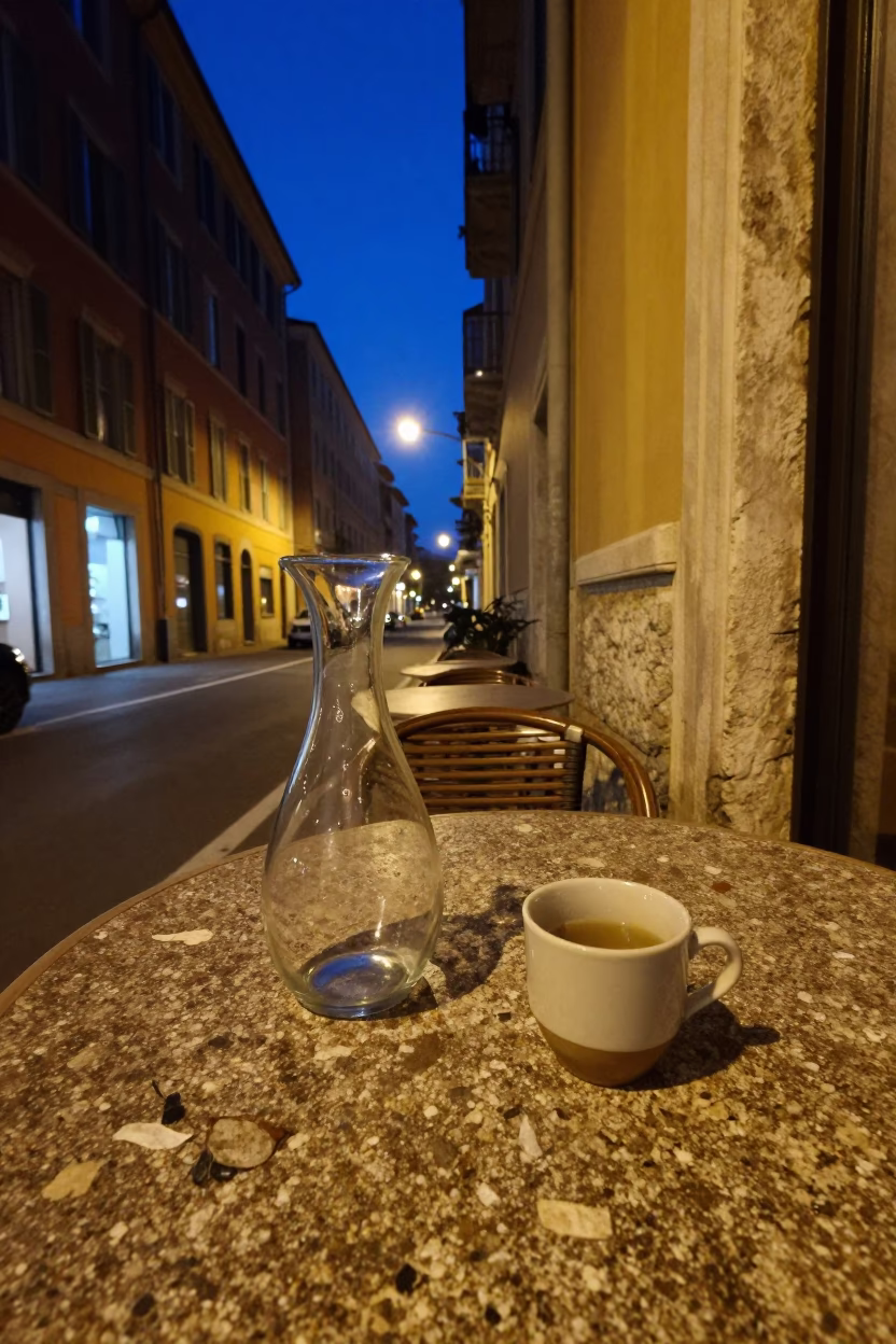 Midnight Street Scene in Nice France with Vintage Carafe and Cup on Cobblestone in in Nice, France
