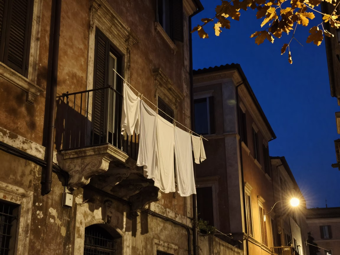 Midnight Street Scene in Rome Italy with Laundry Hanging and Leaf Shadows in in Rome, Italy