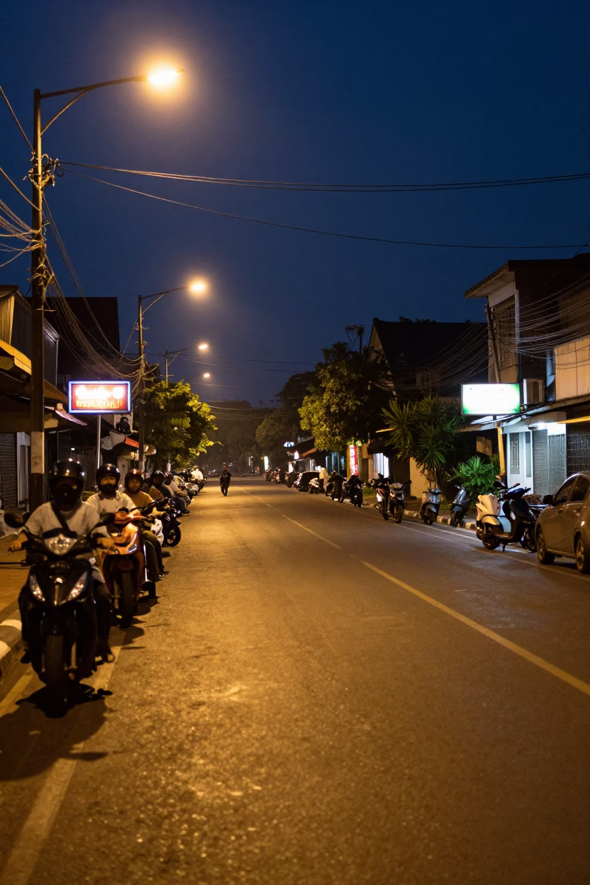 Midnight Street Scene in Surabaya Indonesia with Neon Signs and Motorbikes in in Surabaya, Indonesia