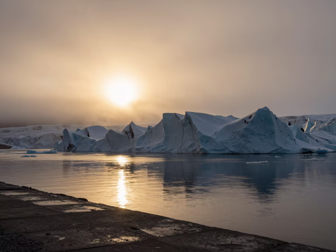 Midnight Sun Glacier Calving into Fjord in along a wave-cut shoreline in Lapland