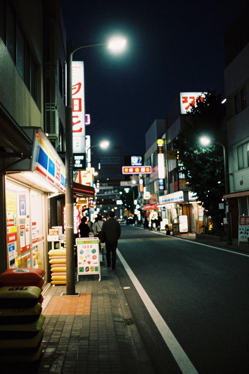 Midnight Tokyo Street Scene with Neon Signs and Convenience Store Cushions in in Tokyo, Japan