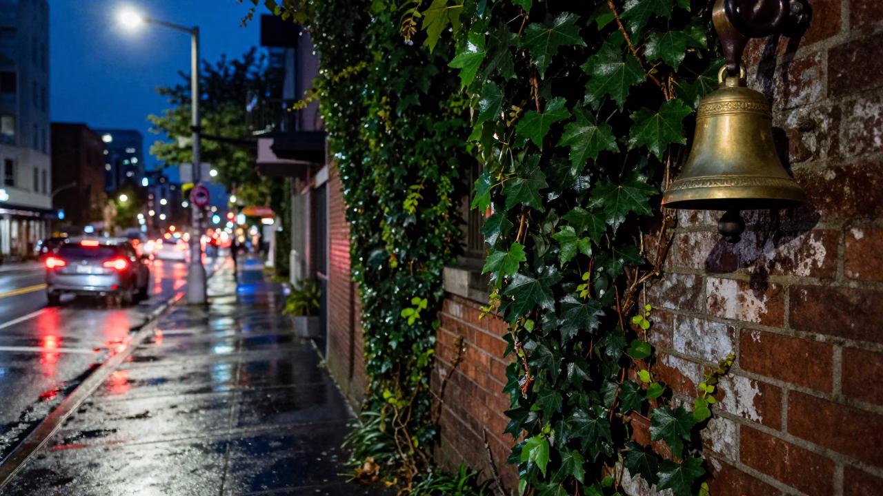 Midnight Vancouver Street Scene with Brass Bell and Ivy on Brick Wall in in Vancouver, British Columbia, Canada