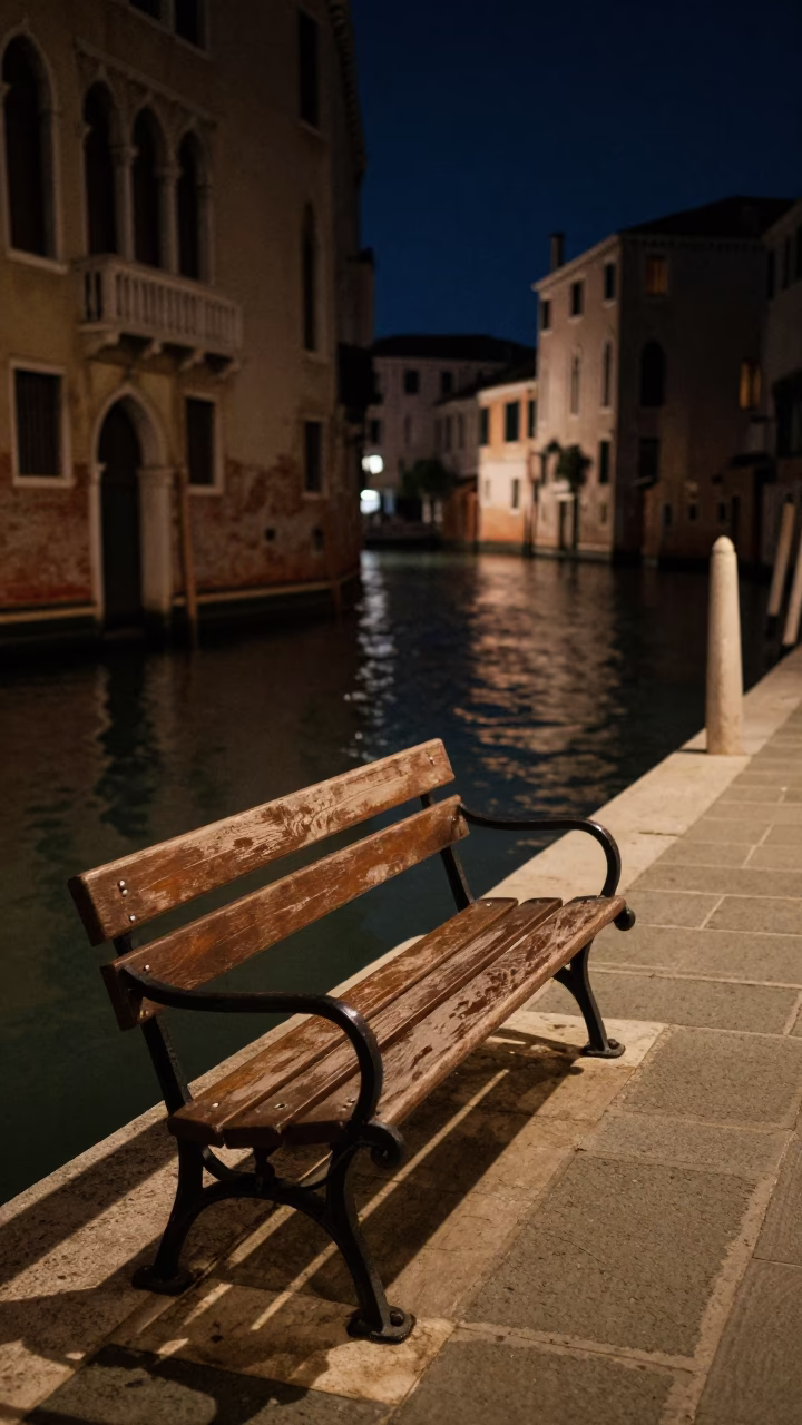 Midnight Venice Canal Scene with Old Wooden Bench and Stone Architecture in in Venice, Italy