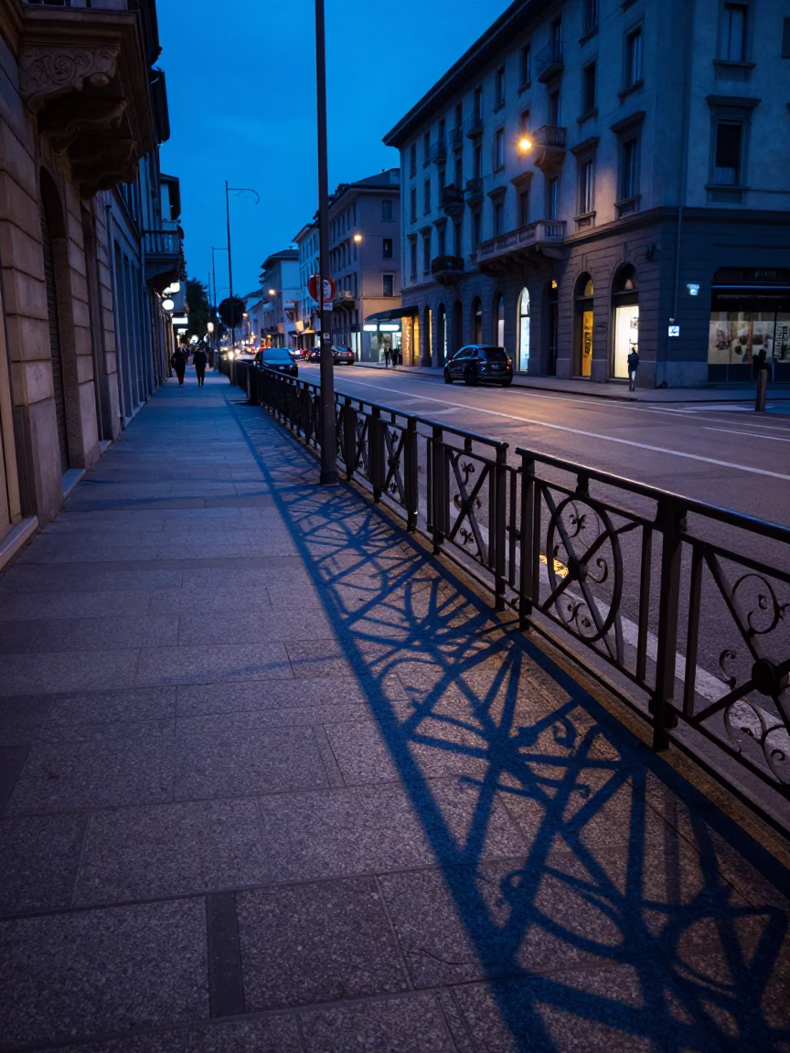 Milan Evening Blue Hour Street Scene with Wicker Shadow on Metal Rail in in Milan, Italy