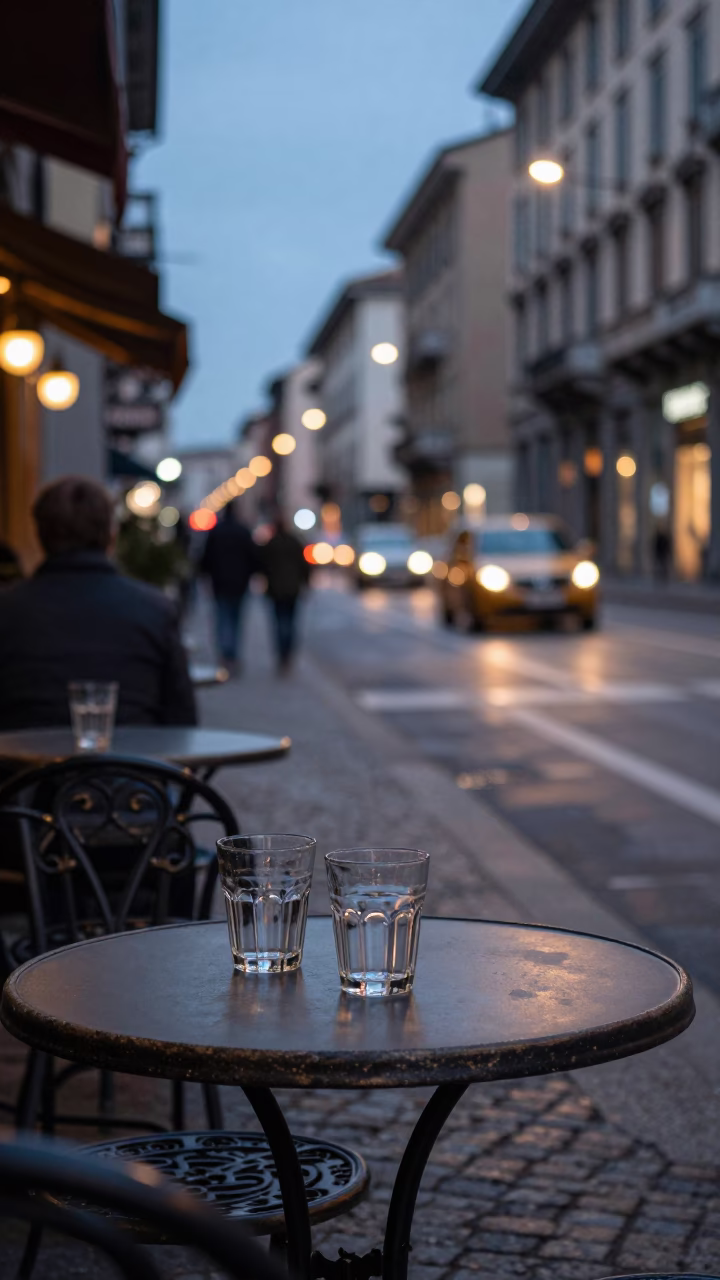Milan Evening Street Scene with Glass Tumblers and Urban Architecture in in Milan, Italy