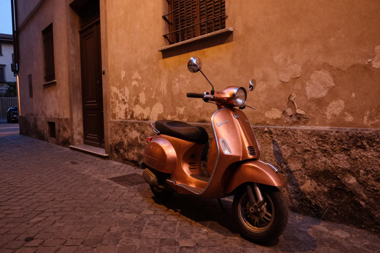 Milan Italy copper toned dusk street scene with vintage scooter and cafe table in in Milan, Italy