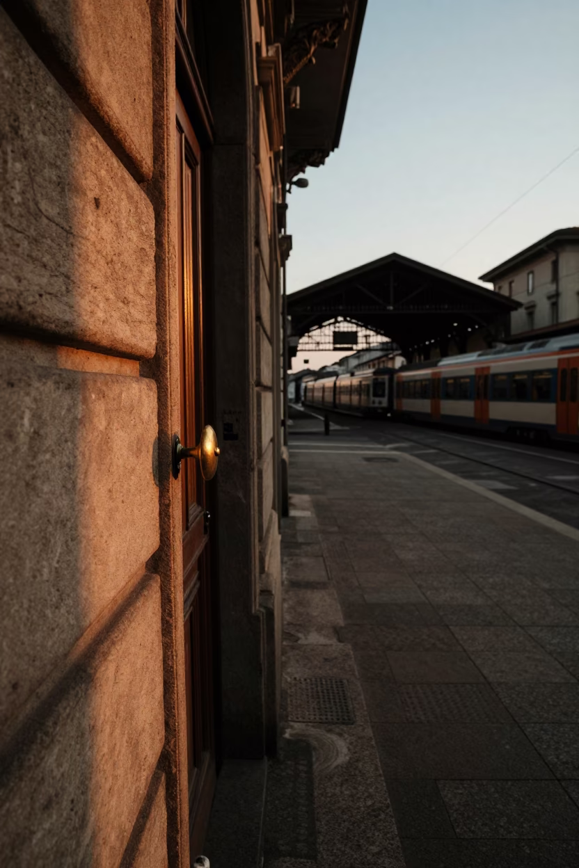 Milan Italy Evening Street Scene with Doorknob and Commuter Train Bridge in in Milan, Italy