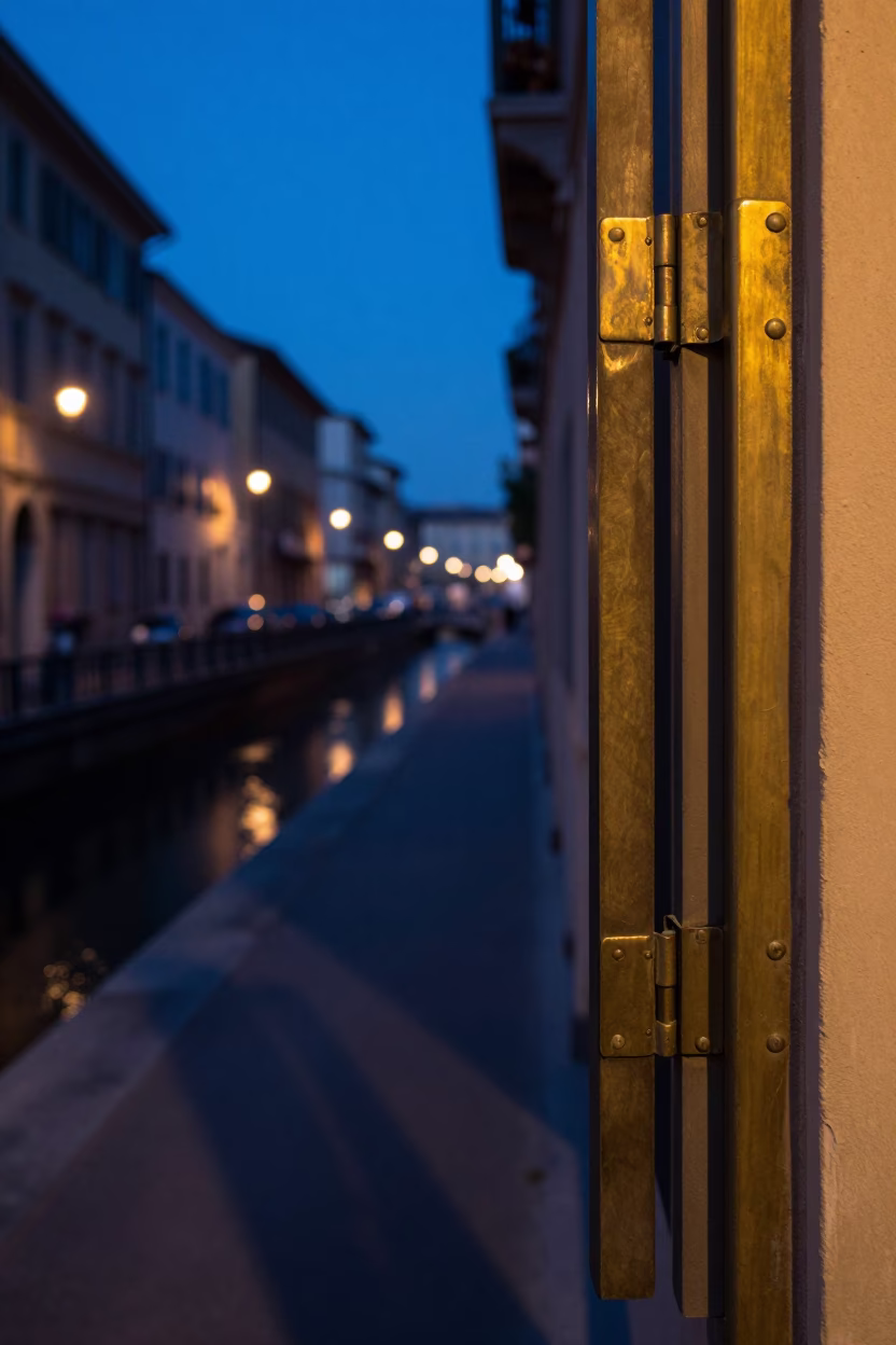 Milan Italy Pre-Dawn Street Scene with Polished Brass Hinge and Wooden Ruler in in Milan, Italy