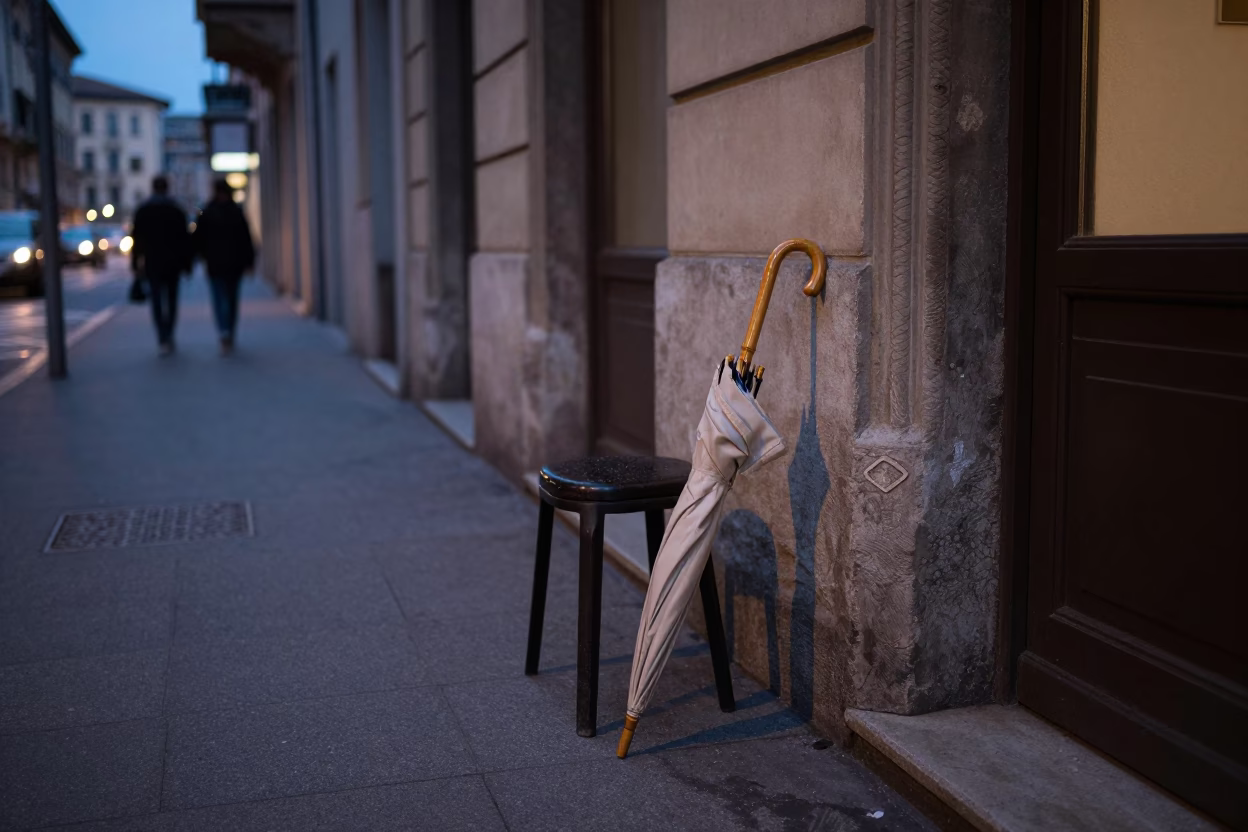 Milan Italy Twilight Street Scene with Umbrella and Stool in 1970s Style in in Milan, Italy