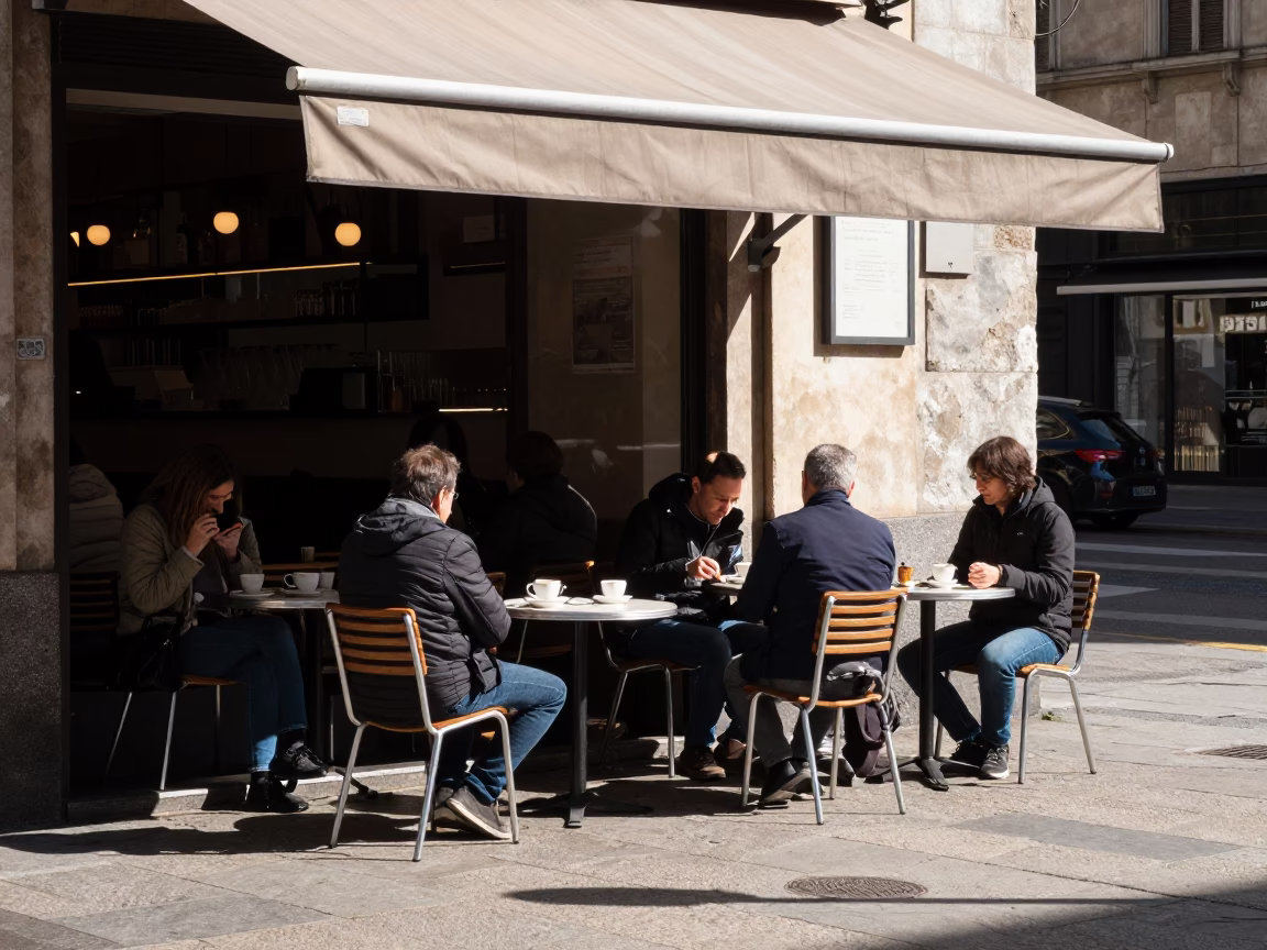Milan Street Cafe Early Afternoon Local Diners Enjoying Coffee and Conversation in in Milan, Italy
