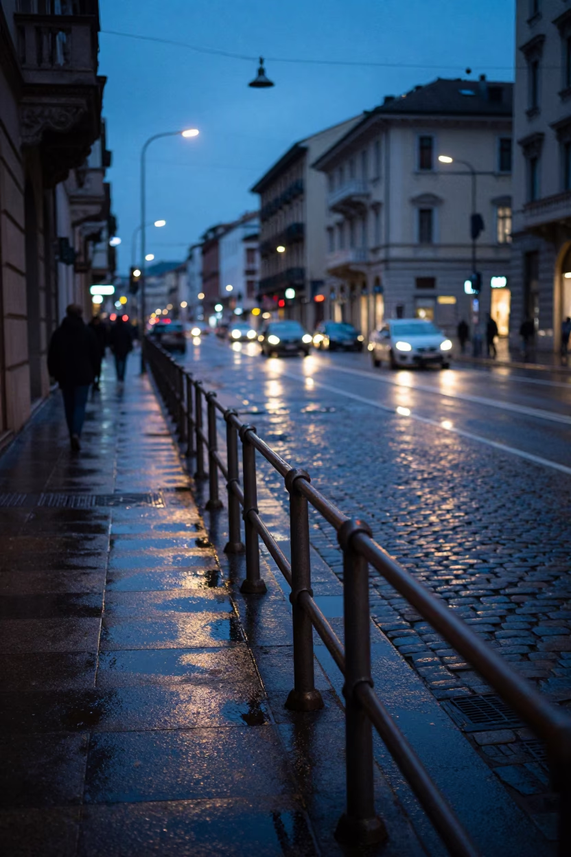 Milan Twilight Street Scene with Grease Sheen on Rail and Urban Reflections in in Milan, Italy