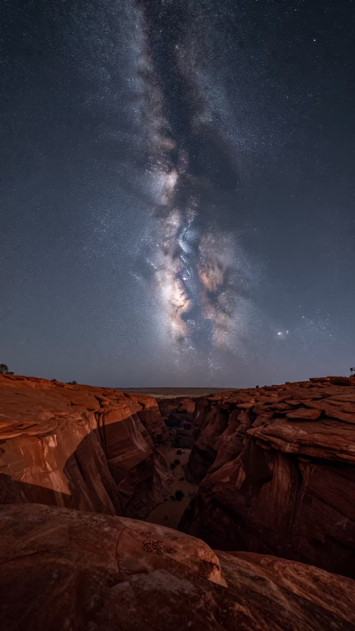 Milky Way Over Australian Desert Canyon Walls in beneath a wind-cut desert escarpment in Australia