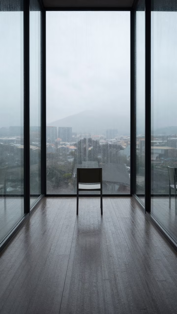 Minimalist Chair in Concrete Lobby Reflections in inside a ribbed concrete lobby near Laureles, Medellin