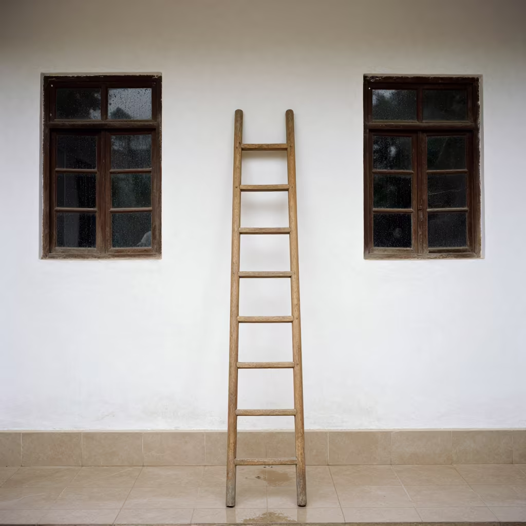 Minimalist Ladder on Whitewashed Wall in Omdurman in inside a tiled stair hall in Omdurman