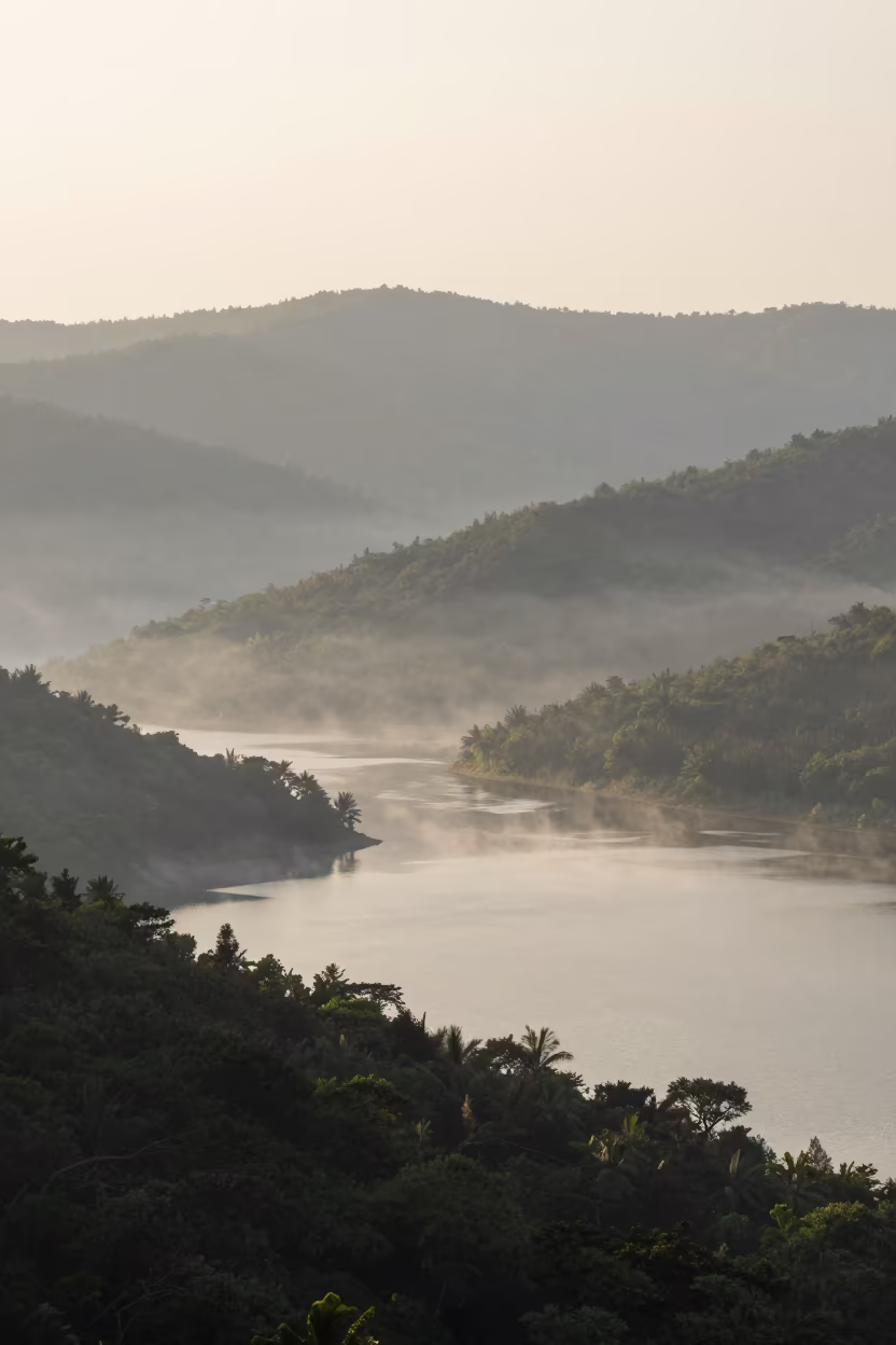 Mist Rising Over Lake at Dawn Near Jashore in from a ridge above layered foothills near Jashore